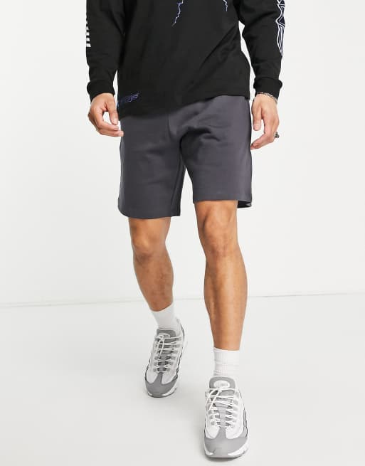 ASOS DESIGN - Oversized jersey short in zwart met wassing