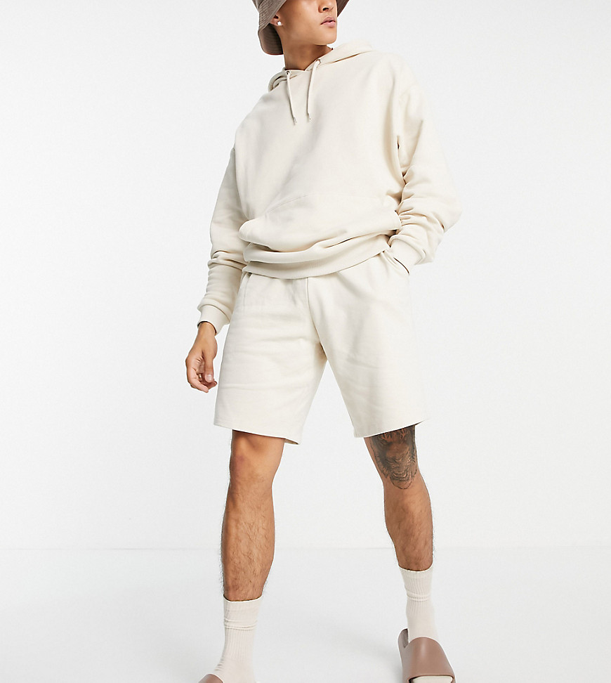 ASOS DESIGN oversized jersey shorts in beige-Neutral