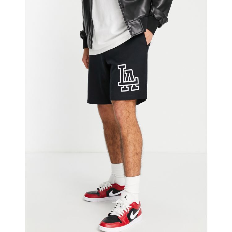 ASOS DESIGN oversized hockey jersey with city print in black and