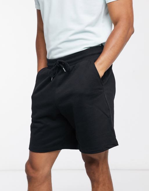 ASOS DESIGN oversized jersey shorts in black
