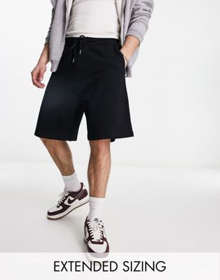 ASOS DESIGN oversized jersey shorts in black - ASOS Price Checker