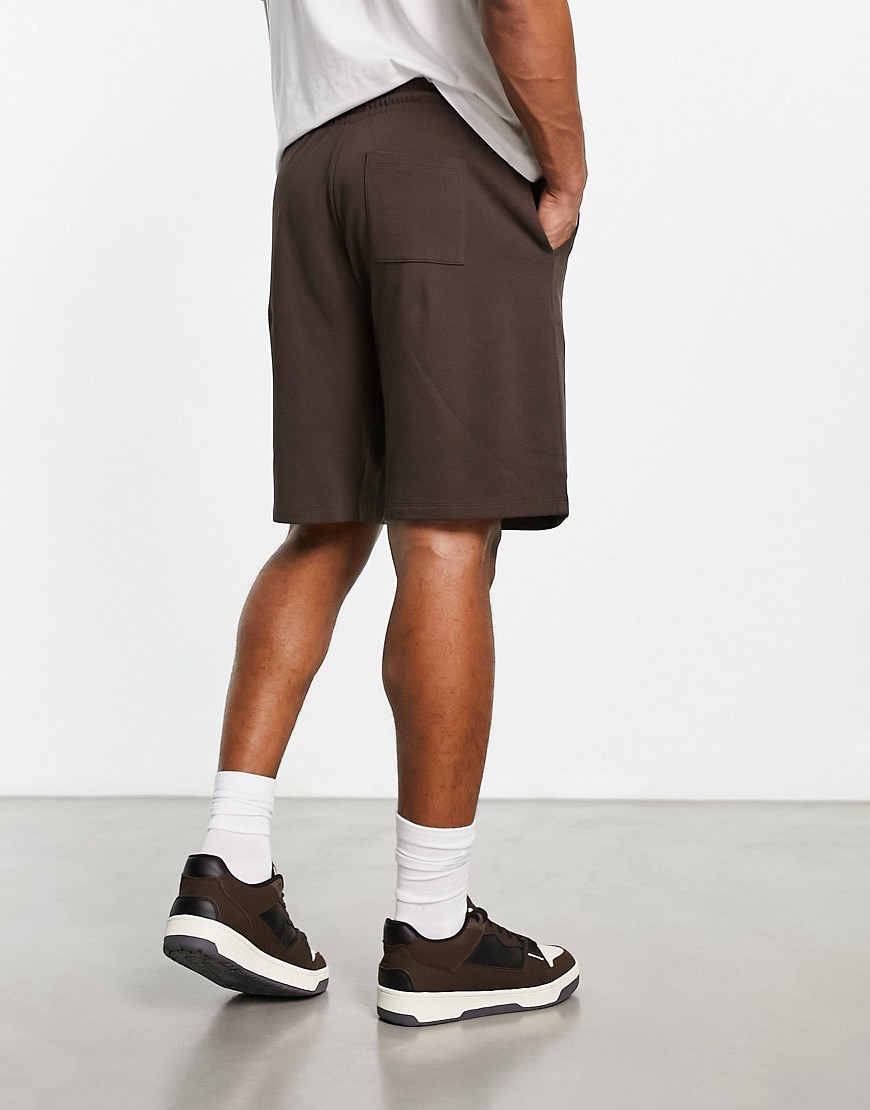 ASOS DESIGN oversized jersey shorts in brown