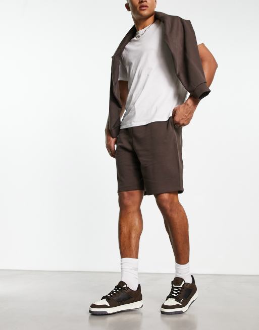 ASOS DESIGN oversized jersey shorts in brown