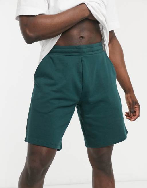 ASOS DESIGN extra long wide shorts in forest green