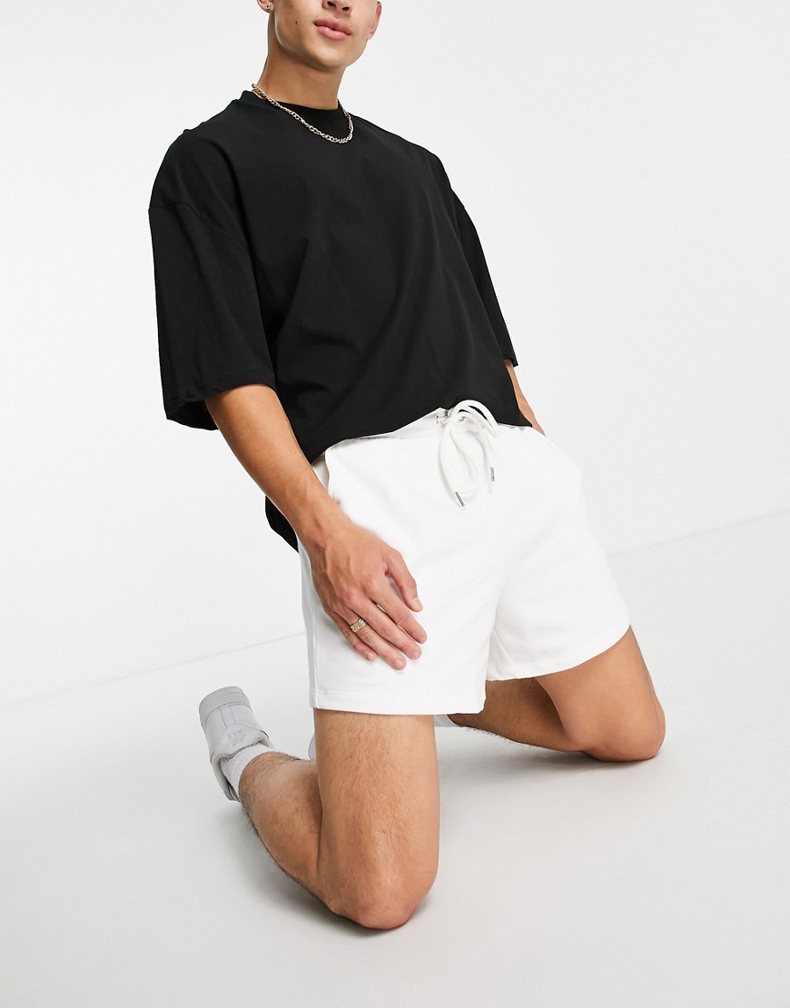 ASOS DESIGN oversized jersey shorts in shorter length in white