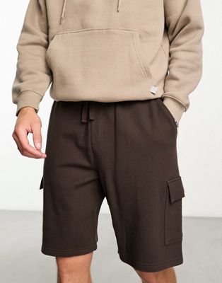 ASOS DESIGN oversized jersey shorts with cargo pocket in brown