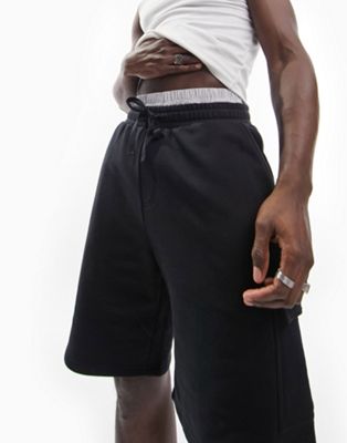 ASOS DESIGN oversized jersey shorts with cargo pocket in washed black