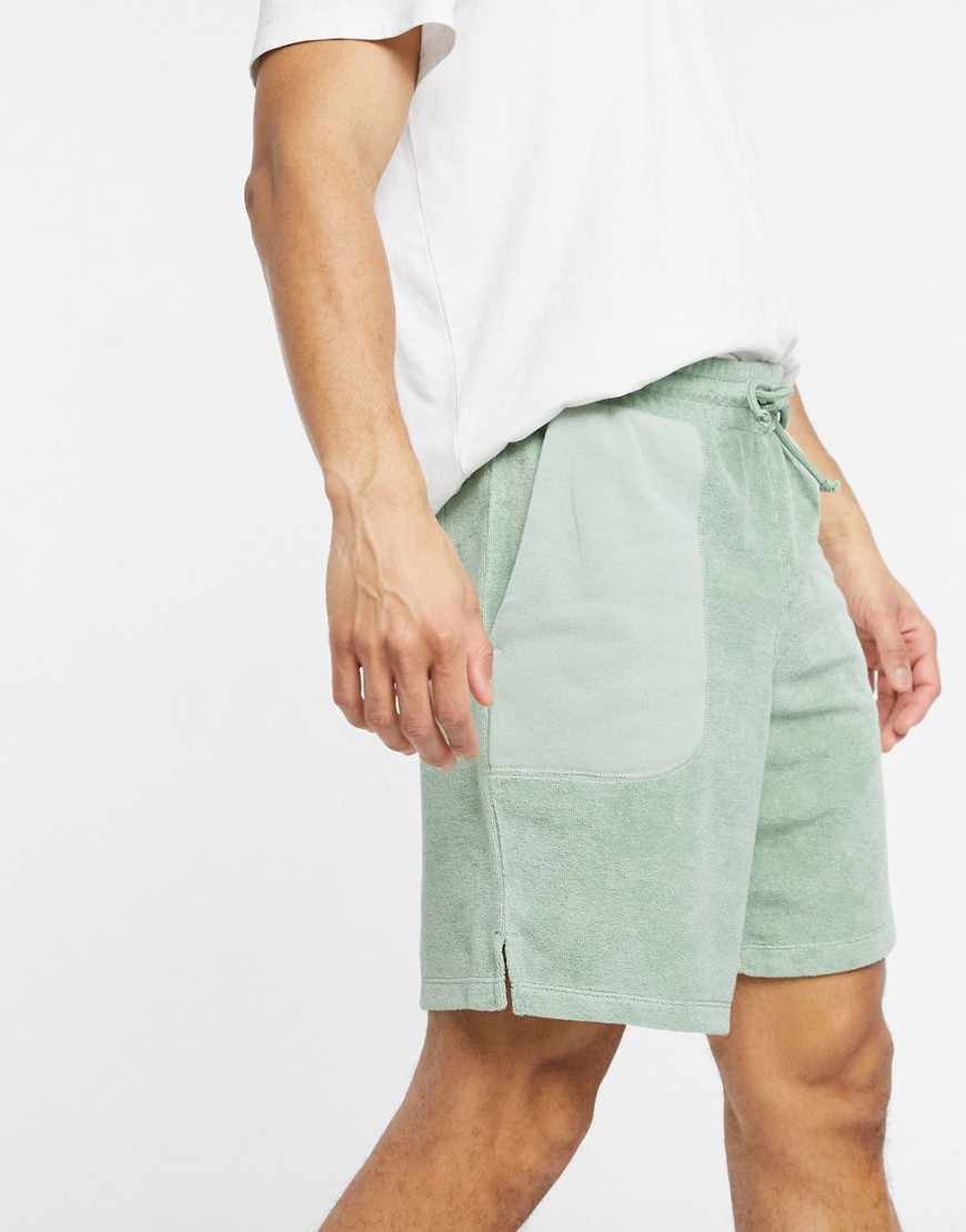 ASOS DESIGN oversized jersey shorts with color block and reverse details - part of a set-Green
