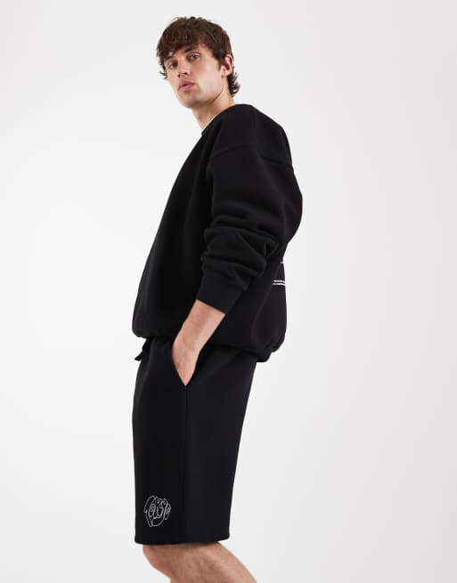 ASOS DESIGN oversized jersey shorts with graphic in black, 3 of 5