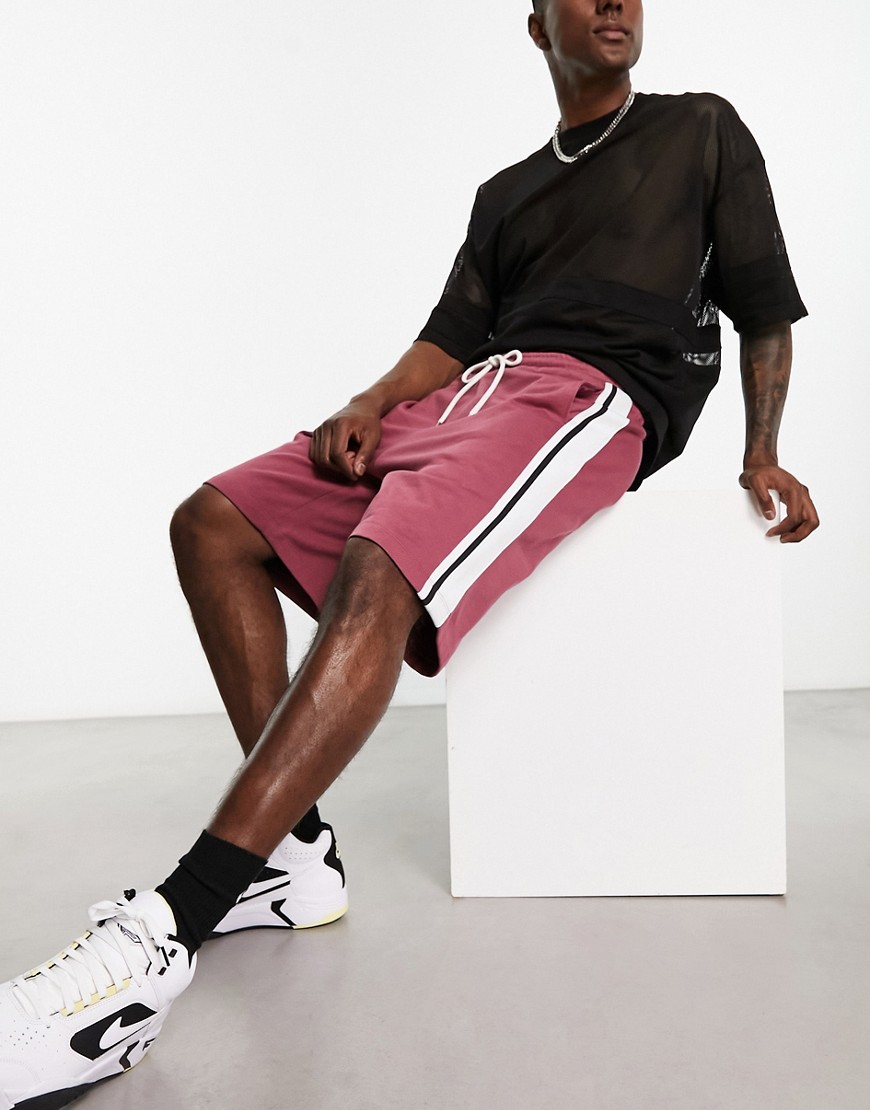 ASOS DESIGN oversized jersey shorts with side tipping in burgundy-Green