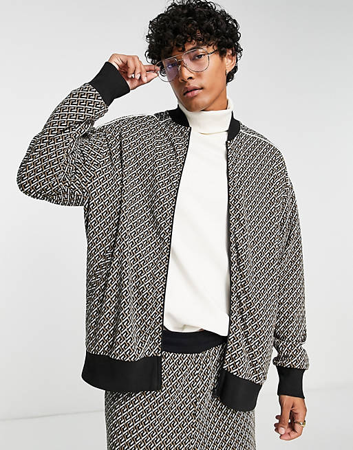 ASOS DESIGN oversized jersey track jacket in jacquard with piping ...