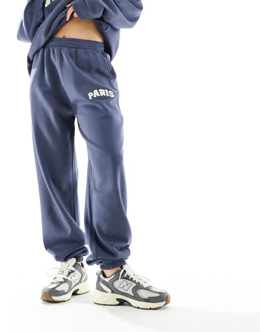 ASOS DESIGN oversized jogger co-ord with paris graphic in light