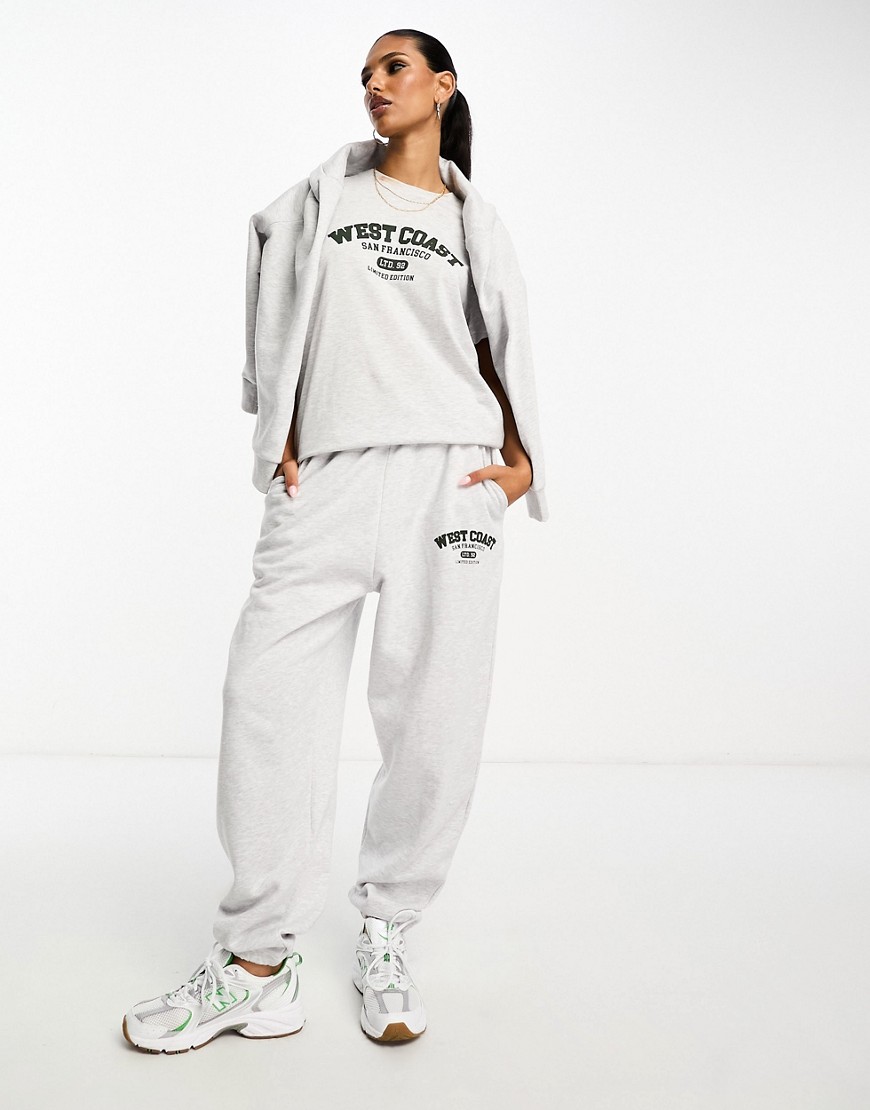 ASOS DESIGN oversized jogger co-ord with west coast graphic in ice marl-Grey