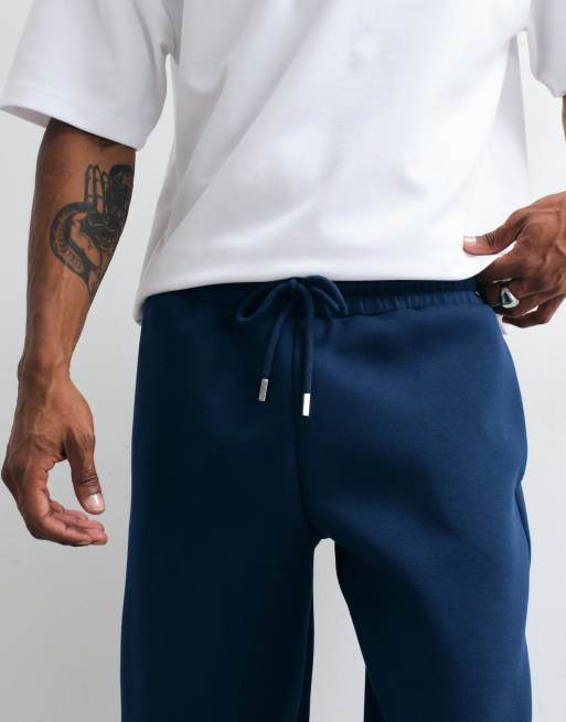 ASOS DESIGN oversized jogger van scuba-achtige stof in navy, 2 van 5