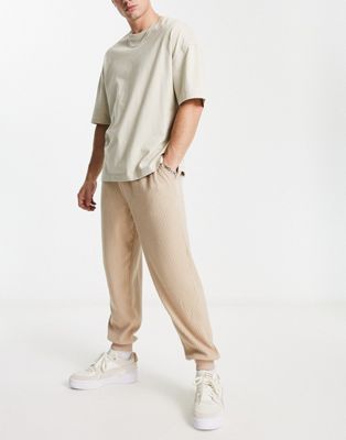 ASOS DESIGN oversized joggers in beige brushed rib texture - ASOS Price Checker