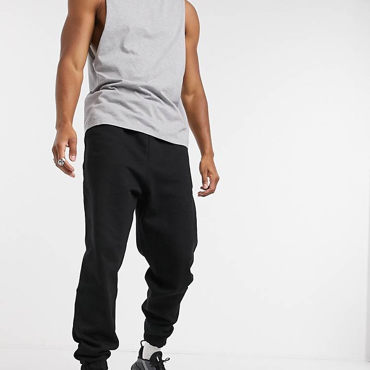 ASOS Sport Oversized woven joggers with character print in & Bademode Sportmode Lange Hosen 