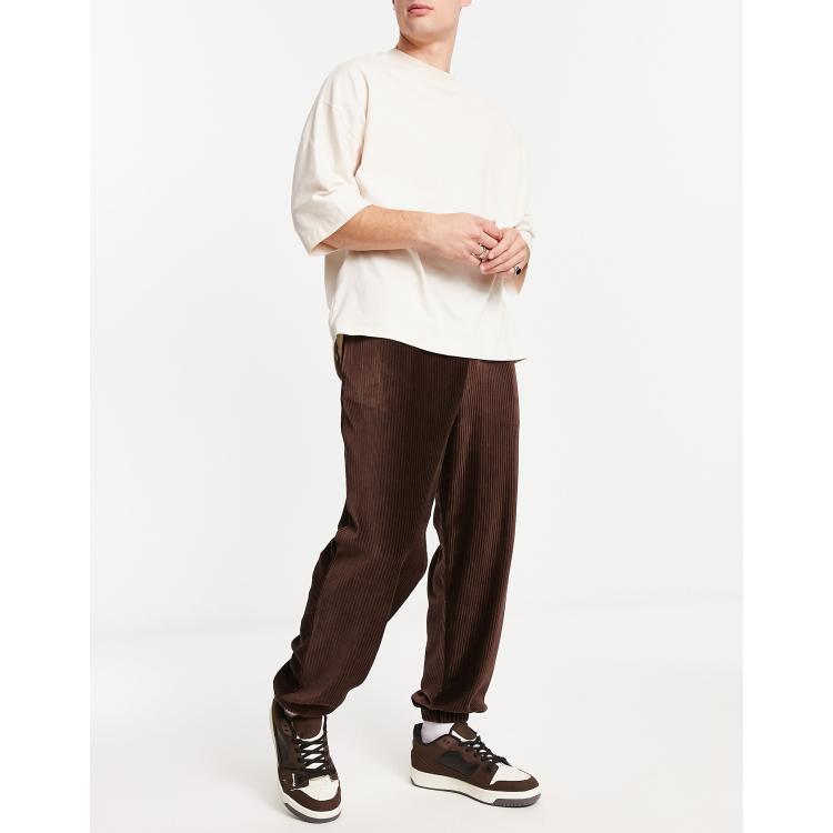 ASOS DESIGN oversized joggers in brown ribbed velour cord ASOS