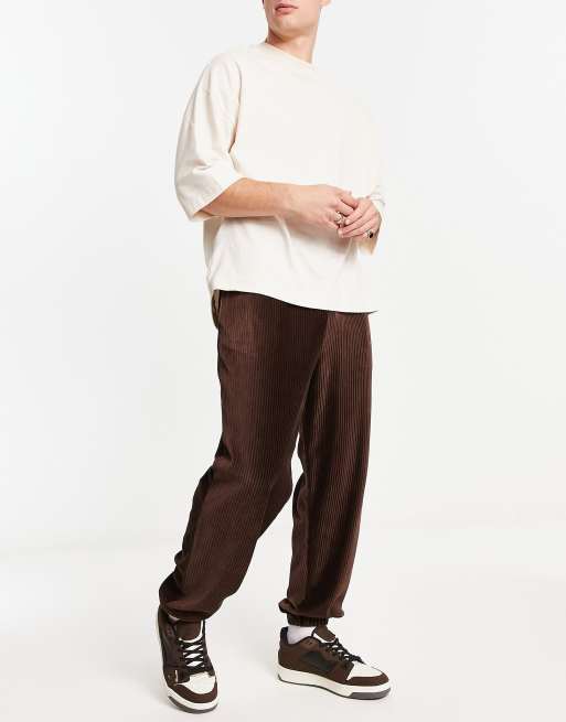 ASOS DESIGN oversized sweatpants with cargo pocket in chocolate brown