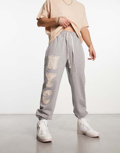 ASOS DESIGN oversized joggers in grey marl with NYC print ASOS