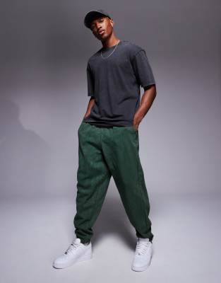 ASOS DESIGN oversized joggers in washed dark green