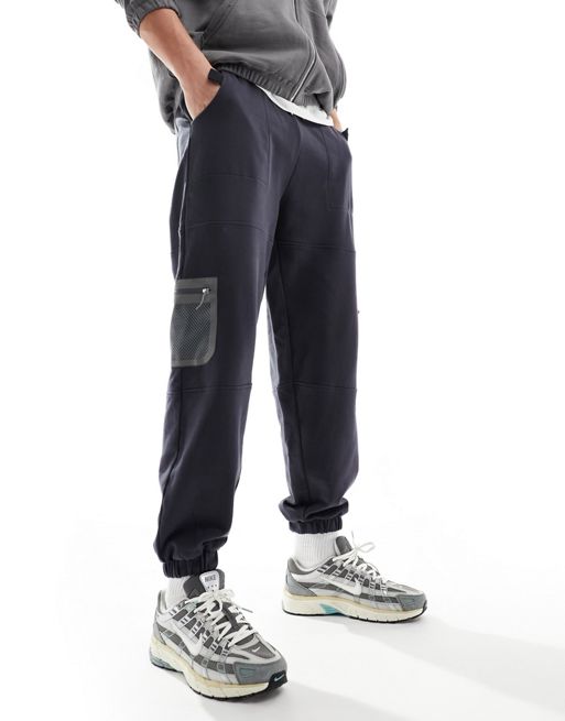 ASOS DESIGN oversized joggers with pocket mesh detail in black | ASOS