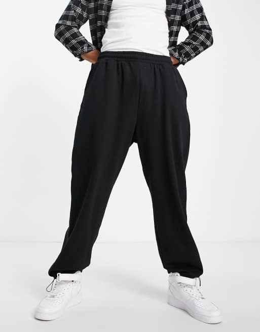 ASOS DESIGN - Oversized joggingbroek in zwart met verstelbare zoom - ZWART