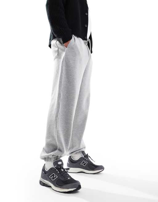 ASOS DESIGN - Oversized joggingbroek met biezen in gemêleerd grijs