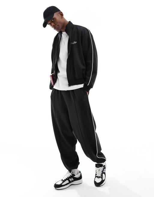 ASOS DESIGN - Oversized joggingbroek met biezen in zwart 