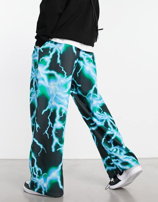 ASOS DESIGN - Oversized joggingbroek met parachutepijpen en bliksemprint, 4 van 4