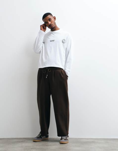 ASOS DESIGN - Oversized joggingbroek met plooien en ballonpijpen in bruin - view 1