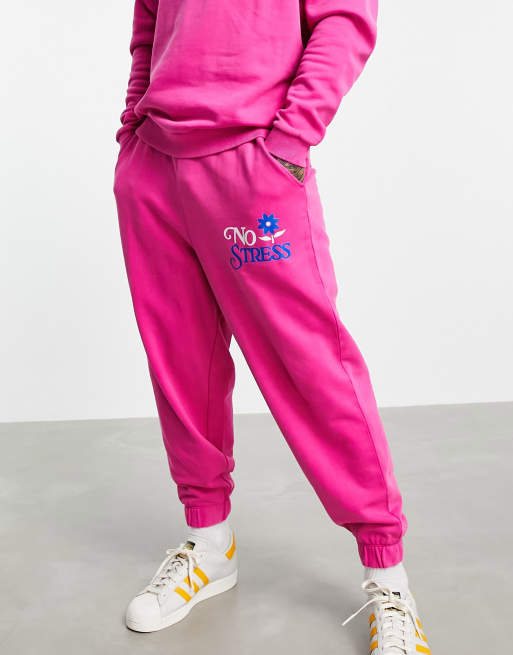 ASOS DESIGN - Oversized joggingbroek met tekstprint in roze acid wash, deel van co-ord set - PINK - PINK