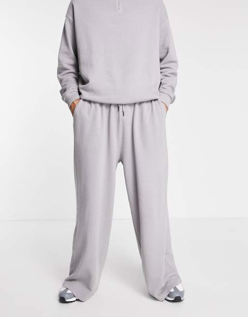 ASOS DESIGN - Oversized joggingbroek met wijde pijpen en wassing in grijs, deel van co-ord set