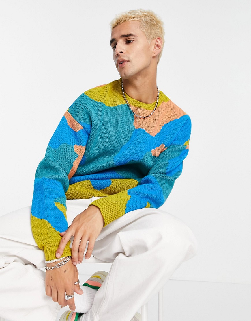 ASOS DESIGN oversized jumper with camo pattern in blue