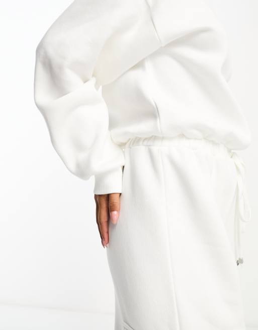 ASOS DESIGN - Oversized jumpsuit van sweaterstof met zakken in crème, 3 van 4