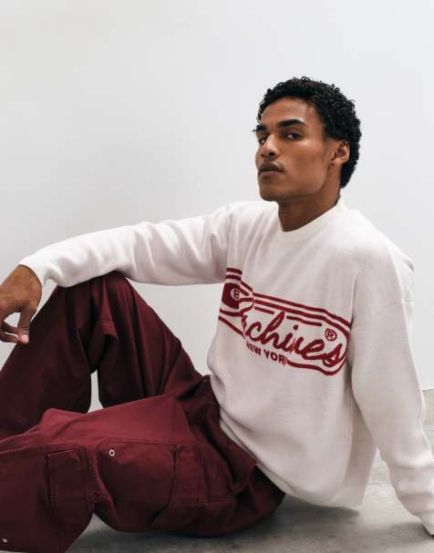 ASOS DESIGN oversized knit crew neck sweater in white with red archives graphic - view 1