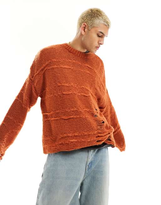 ASOS DESIGN oversized knit distressing ladder detail sweater in burnt orange