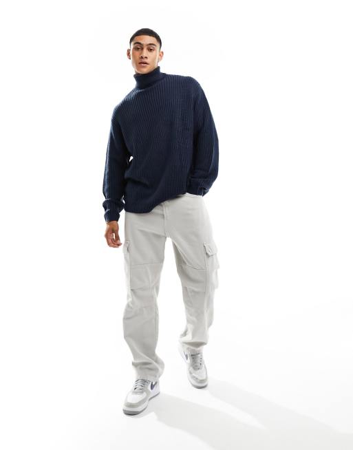 ASOS DESIGN oversized knit fisherman rib roll neck sweater in navy