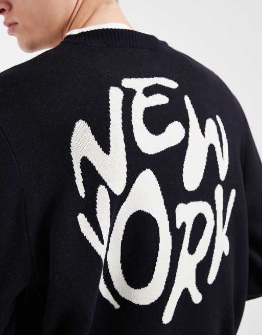 ASOS DESIGN oversized knit sweater with New York graphic in navy, 2 of 5