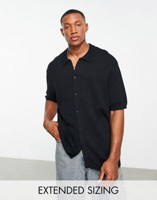ASOS DESIGN oversized knitted button through polo in black