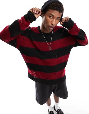 ASOS DESIGN oversized knitted distressed jumper with black and red stripe