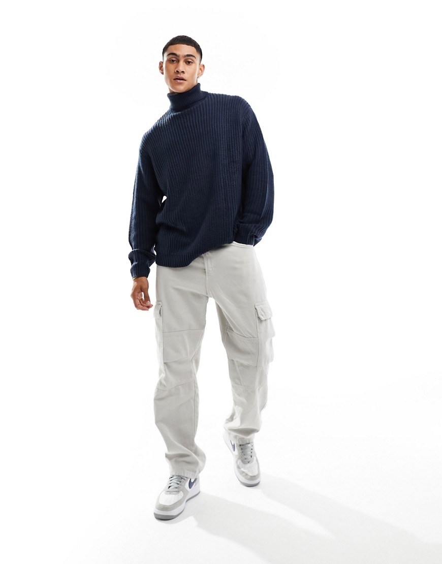 ASOS DESIGN oversized knitted fisherman rib roll neck jumper in navy