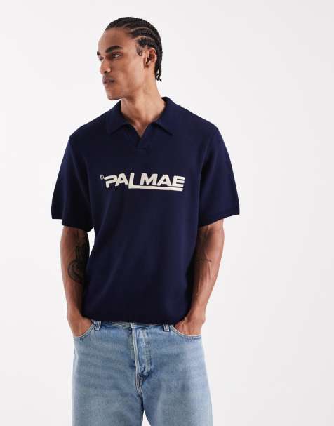 ASOS DESIGN oversized knitted notch neck polo with PALMAE graphic in navy - view 1