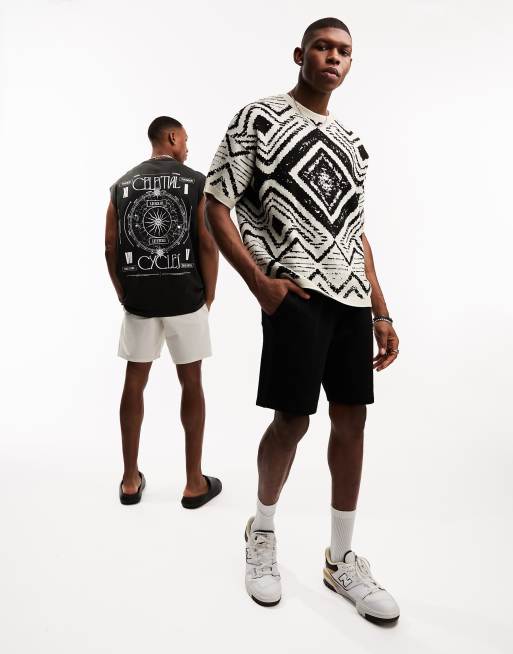 ASOS DESIGN oversized knitted t shirt with aztec print in black