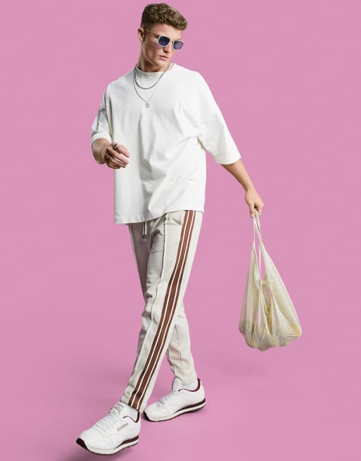 ASOS DESIGN - Oversized kraftig T-shirt med trekantsdetalje i cremefarve