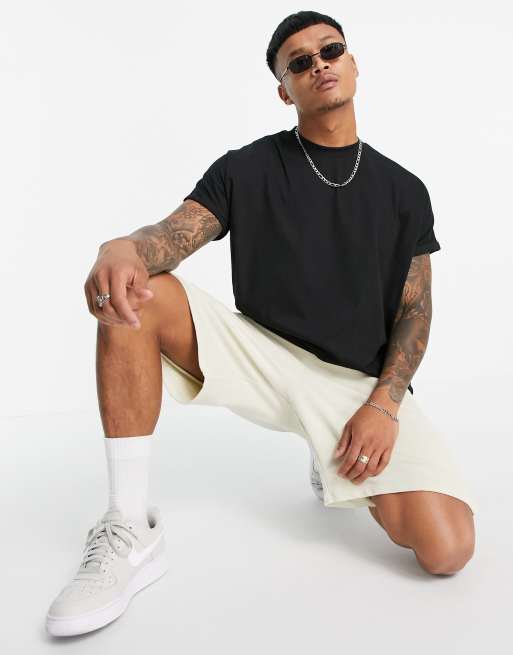 ASOS DESIGN - Oversized lang T-shirt met ronde hals en omgeslagen mouwen in zwart