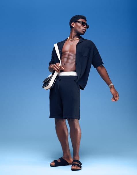 ASOS DESIGN oversized lightweight textured shorts in black - part of a set - view 1
