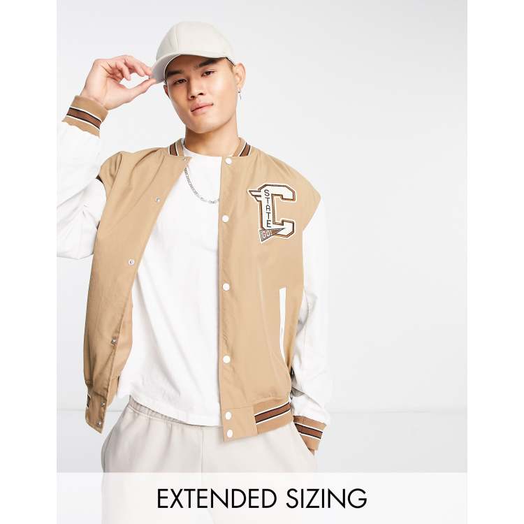 ASOS DESIGN varsity bomber jacket in tan