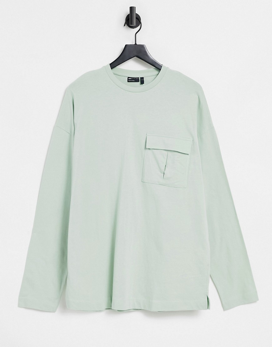 ASOS DESIGN oversized long sleeve heavyweight T-shirt with utility pocket in pastel green-Grey
