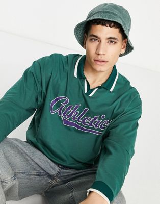 ASOS DESIGN oversized long sleeve polo t-shirt in green with front print & v-neck