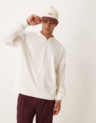 ASOS DESIGN ASOS DESIGN oversized long sleeve polo with revere collar in cream-White